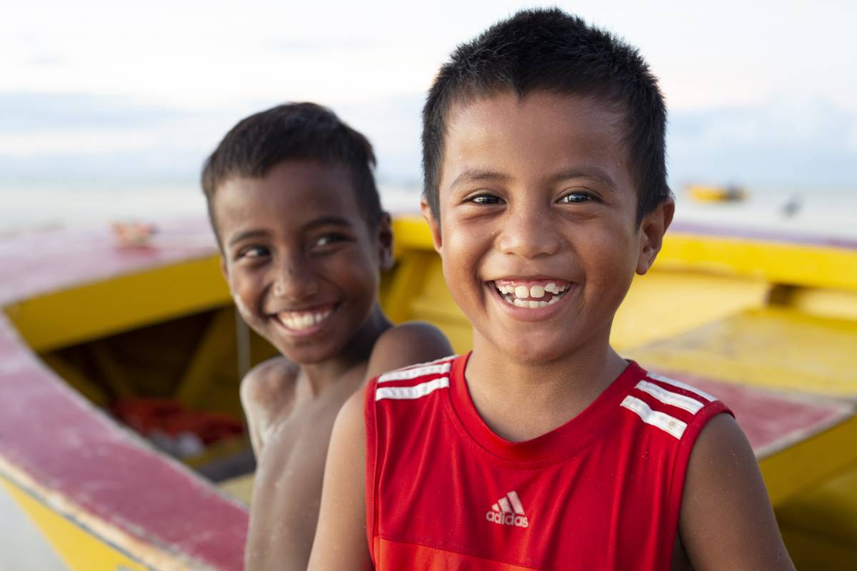 Children fishing in Betio, Kiribati. 