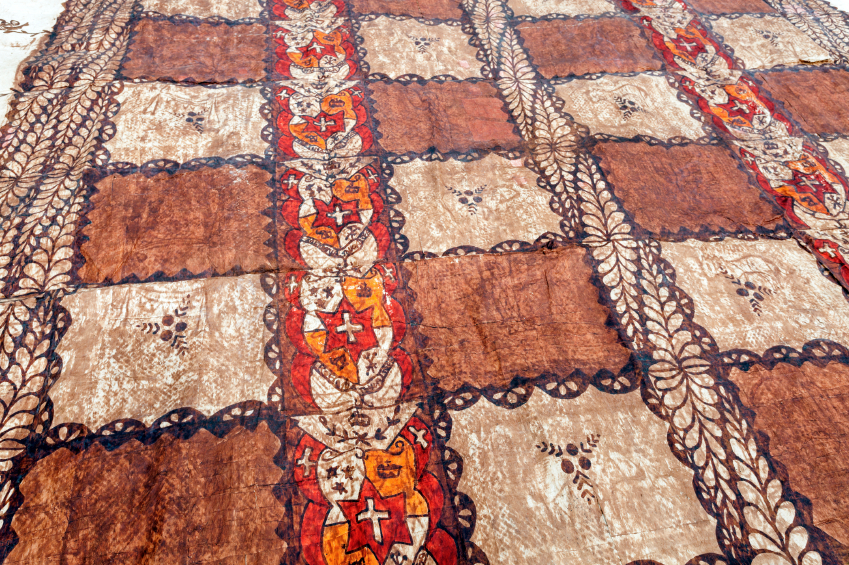 A tapas cloth on the ground. 